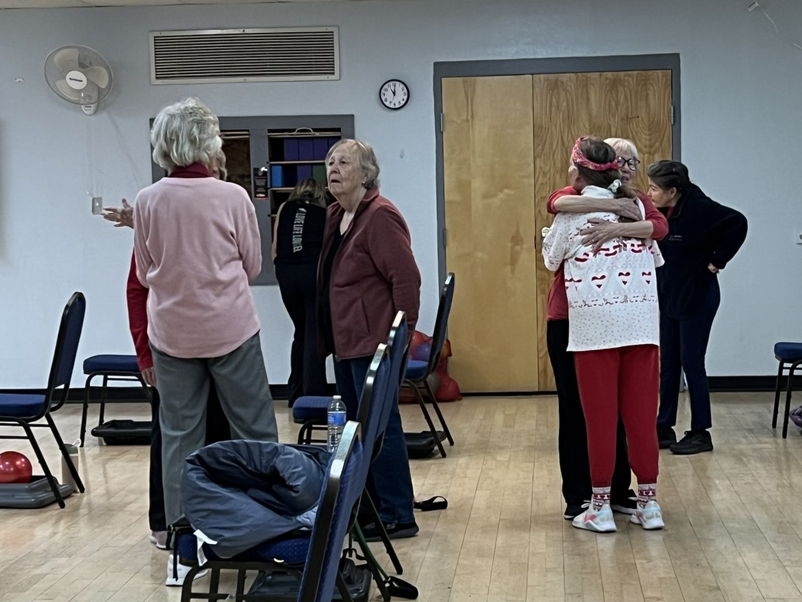 Older adult exercising and connecting in a YMCA wellness space