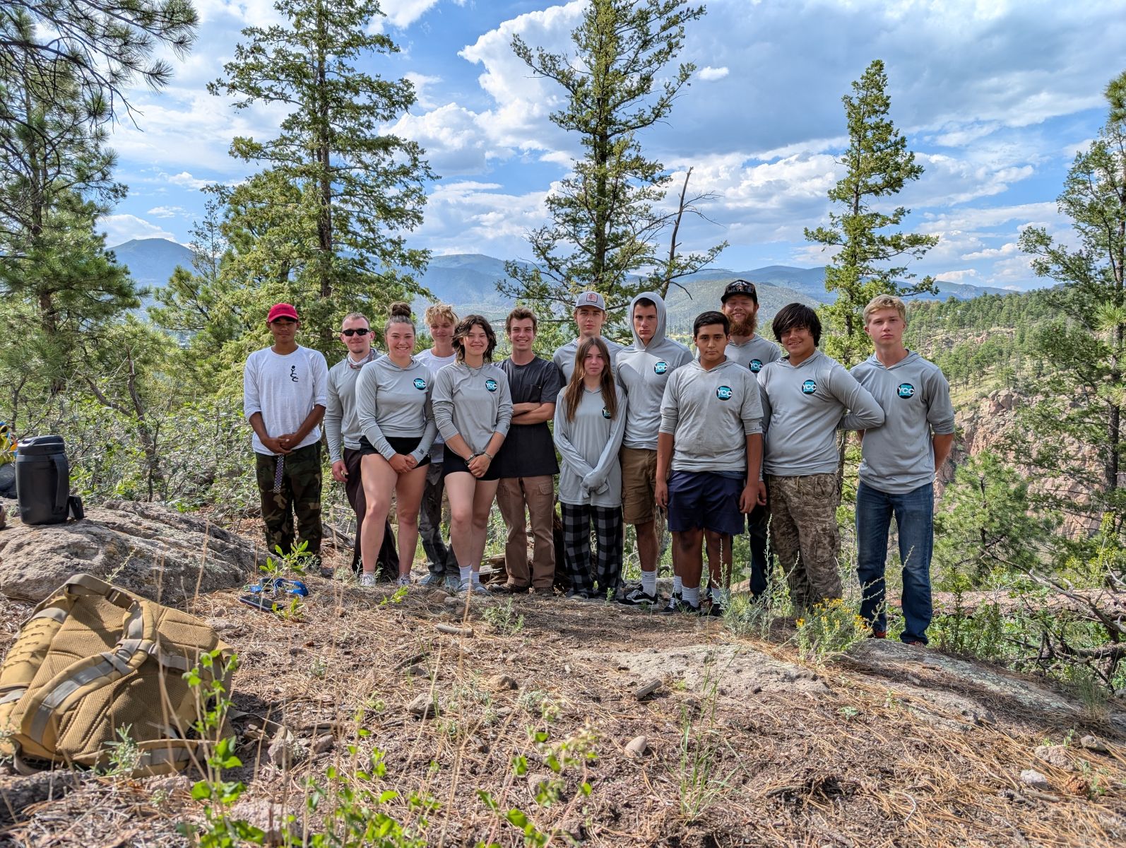 YCC crew group photo on a forest overlook
